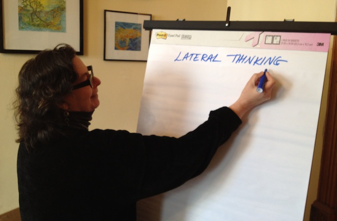 Liz Dreyer of EmcArts prepares for our lateral thinking exercises.