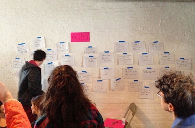 An "agenda wall" at a Culturebot event.