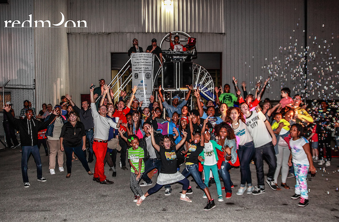 Collaborators and friends celebrate at Redmoon's Pilsen space during a culminating event for its recent Summer Park series. Image: Al Zayed.